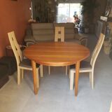 Round extendable teak dining table from the 60s