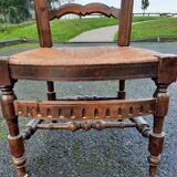 Chaise basse paillee dite chauffeuse