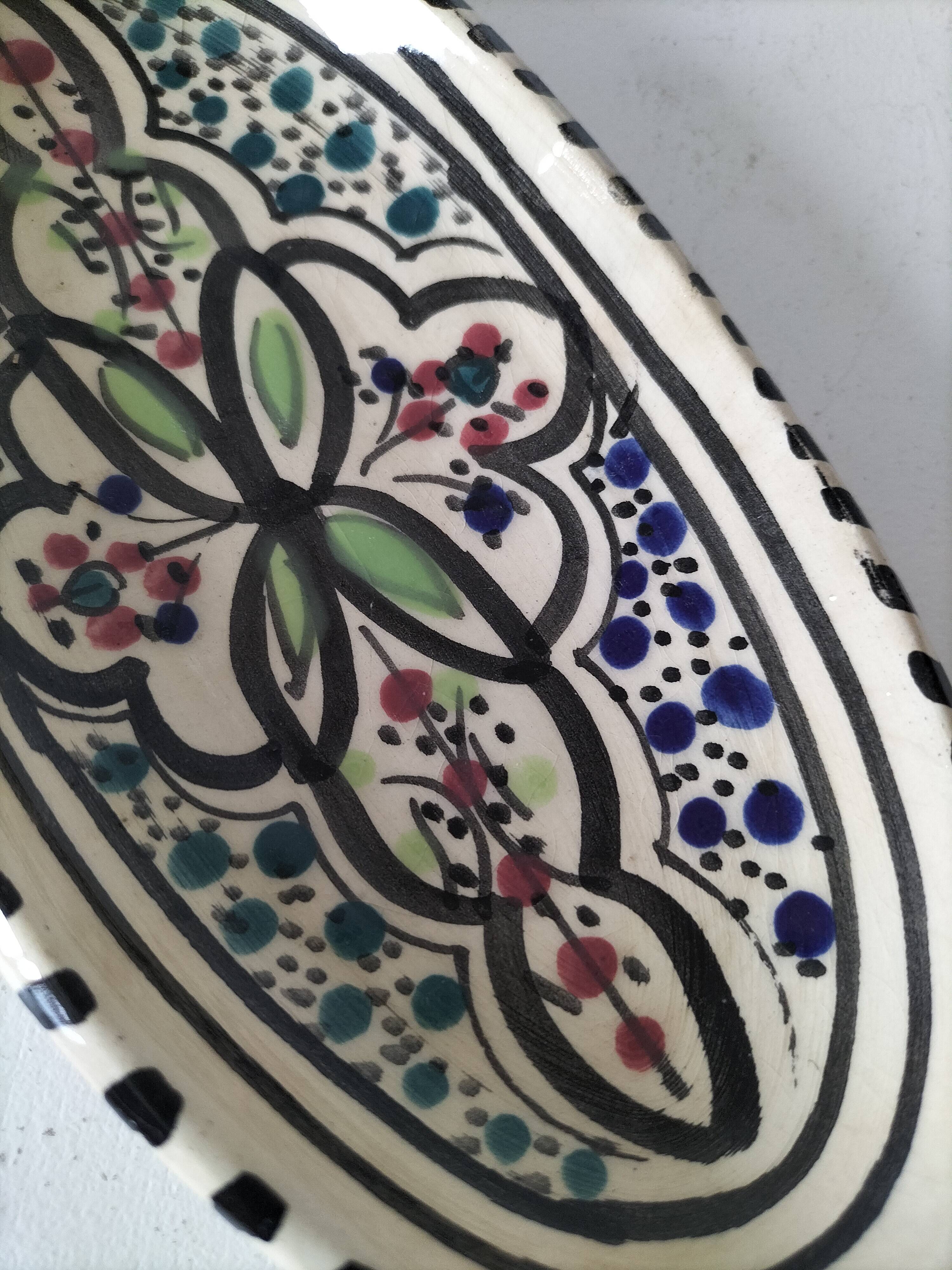 Moroccan glazed ceramic dish in Safi craft style