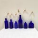 Set of 6 cobalt blue glass pharmacy bottles