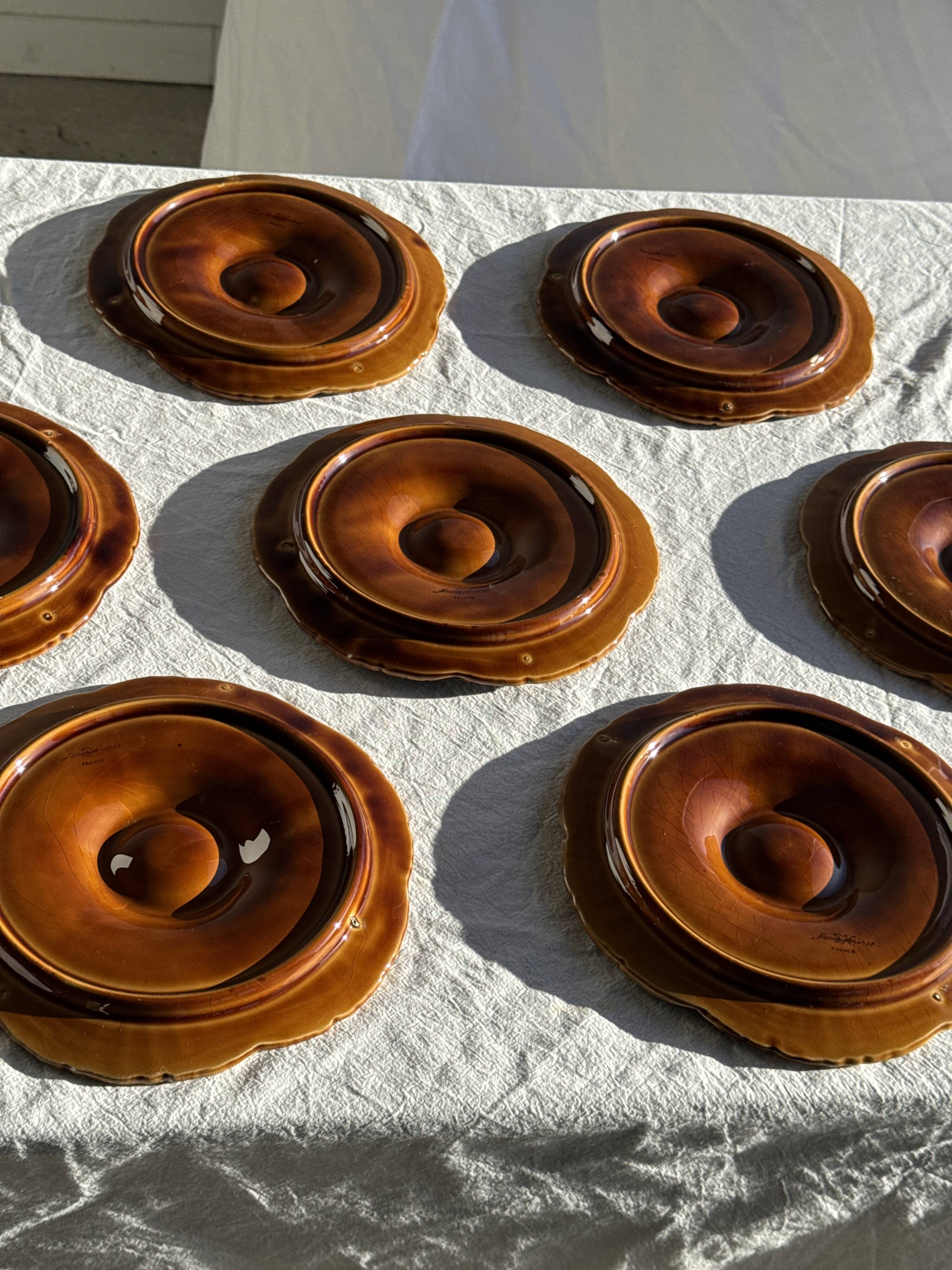 Set of 12 oyster or shell plates in glazed brown ceramic D