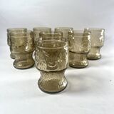 Brown water glasses decorated with citrus slices