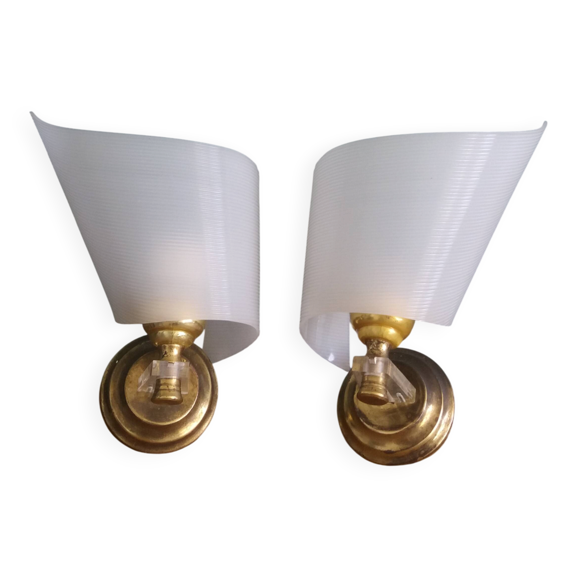 Golden metal appliques and plexiglass perspex in the style of Maison Lunel or Guariche.