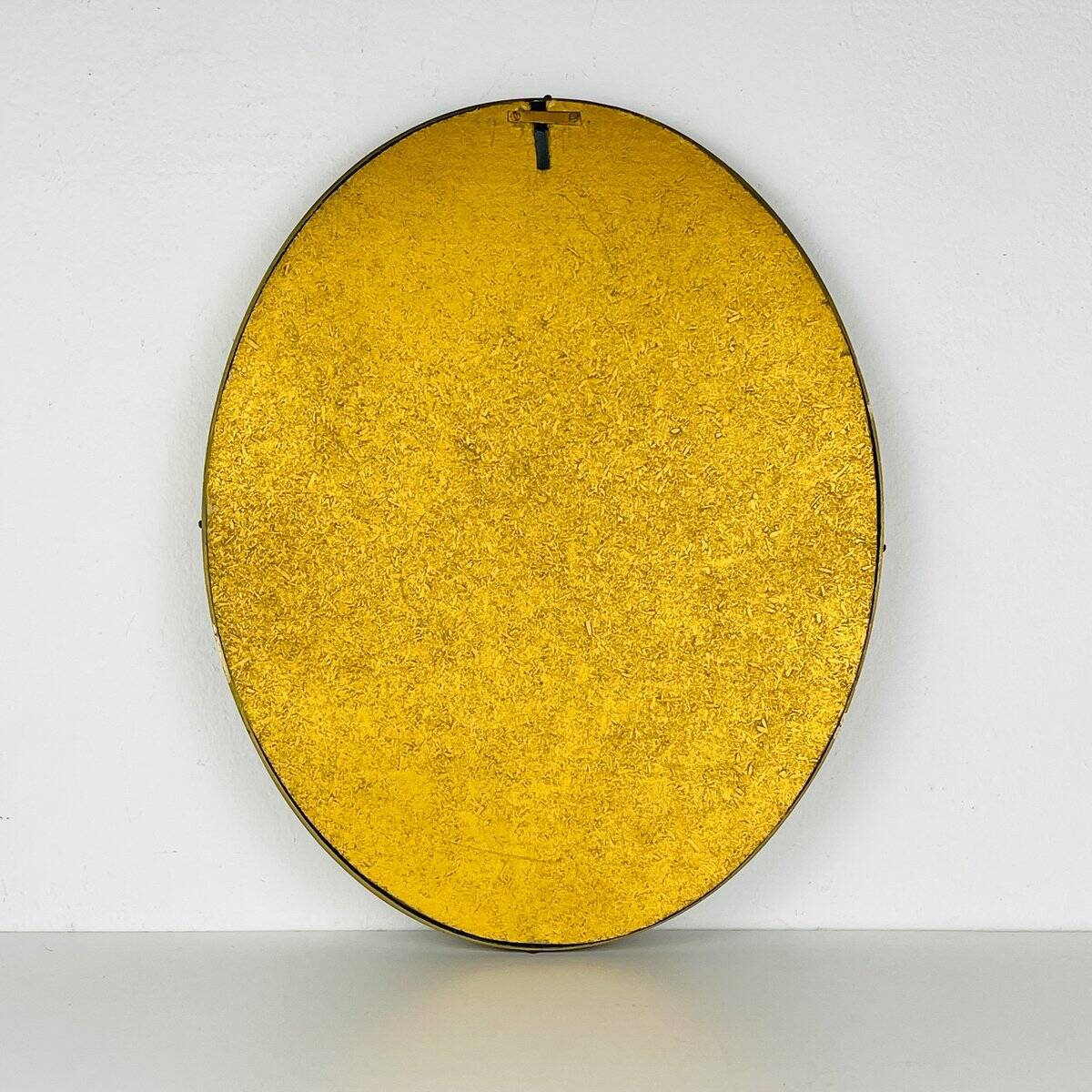 Vintage mirror in a brass frame, Italy, 1950s.