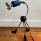 Articulated tripod foot lamp inspired by the Memphis movement