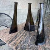 Trio of intertwined bottles signed Paco for O.Frey