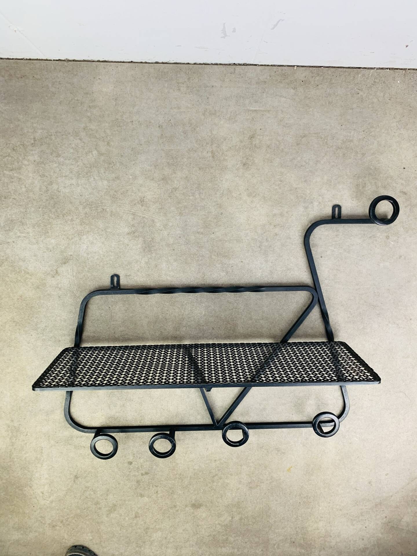Wall-mounted coat rack/wardrobe from the 1950s, wrought iron and rigidule.