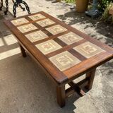 Vintage 60s coffee table with tile decoration of birds and flowers.