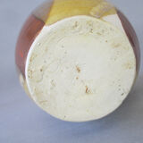 Signed anthropomorphic sandstone vase to be identified