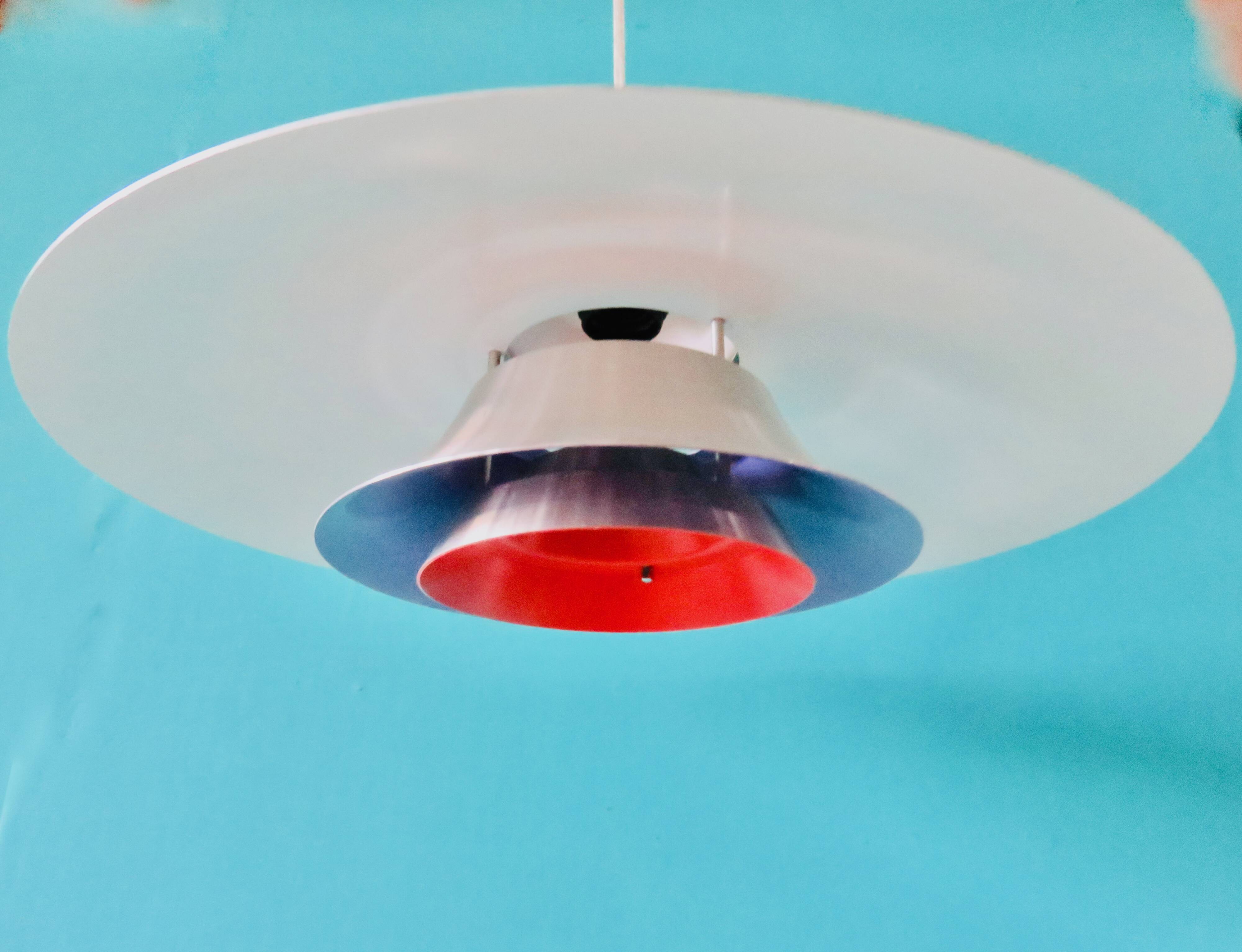 Suspension in brushed aluminum, interior in 3 colors. Denmark 1970