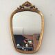 Old vintage mirror in gilded wood