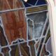 Large solid wood frame composed of 5 stained glass niches