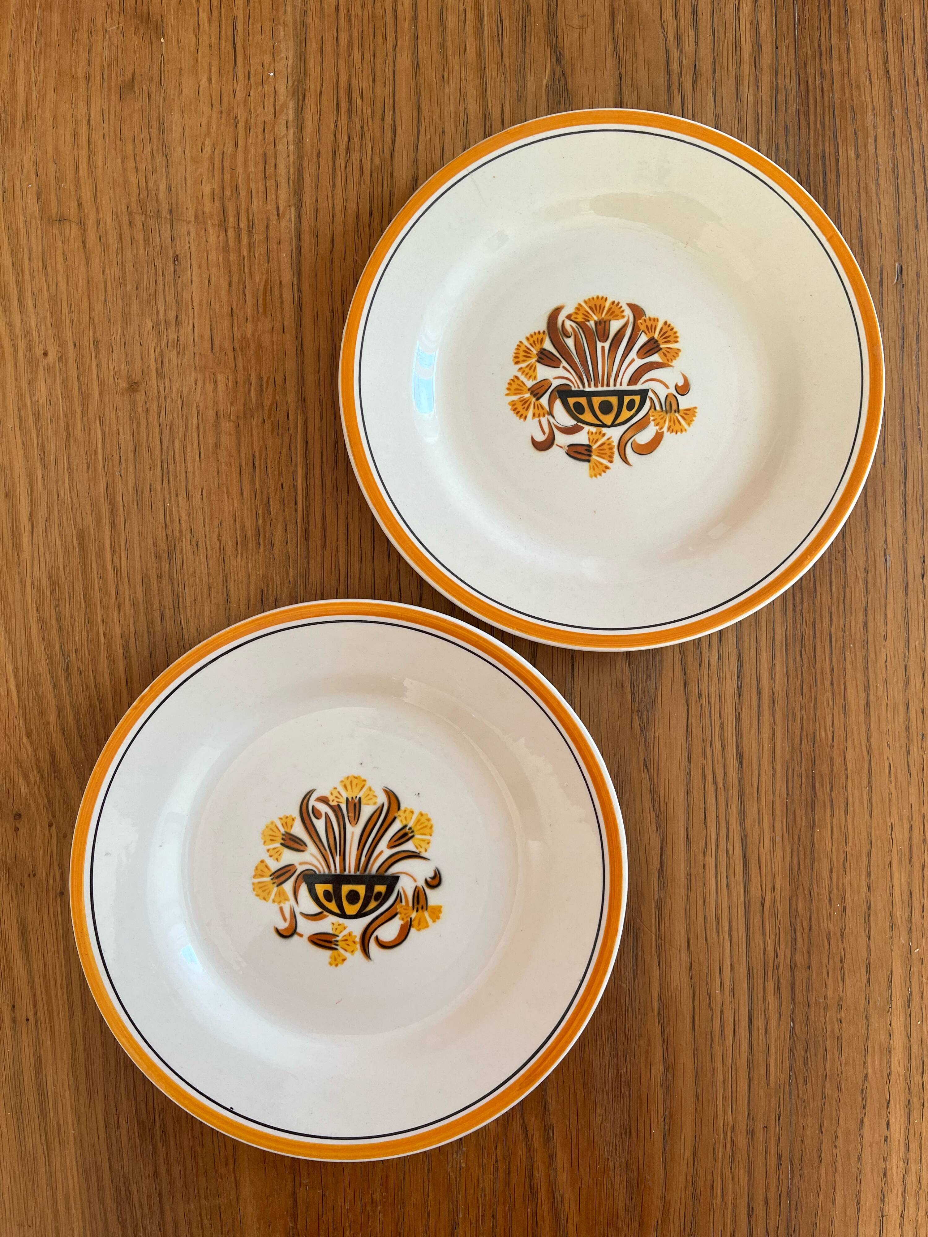 2 flat ironstone plates, Carnations, Creil and Montereau
