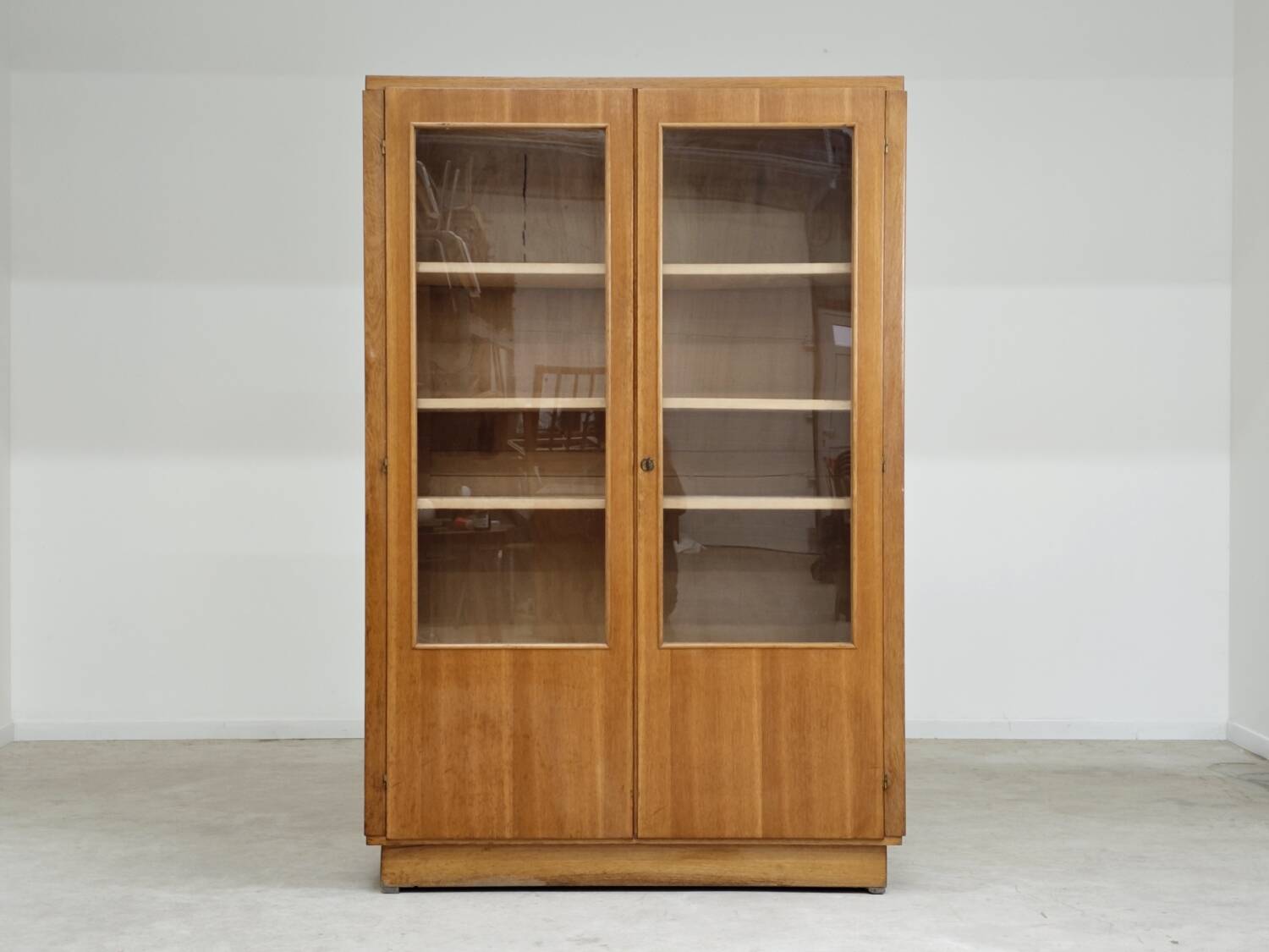Oak glass-fronted school cabinet 1960