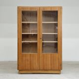 Oak glass-fronted school cabinet 1960