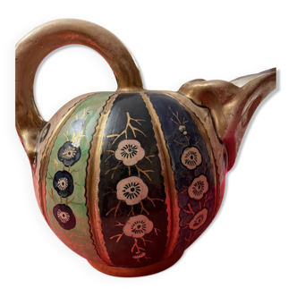 Pitcher with floral decoration and gold enamel