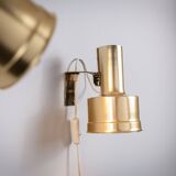 Pair of adjustable wall lamps designed by Per Sundstedt for Kosta Lampan