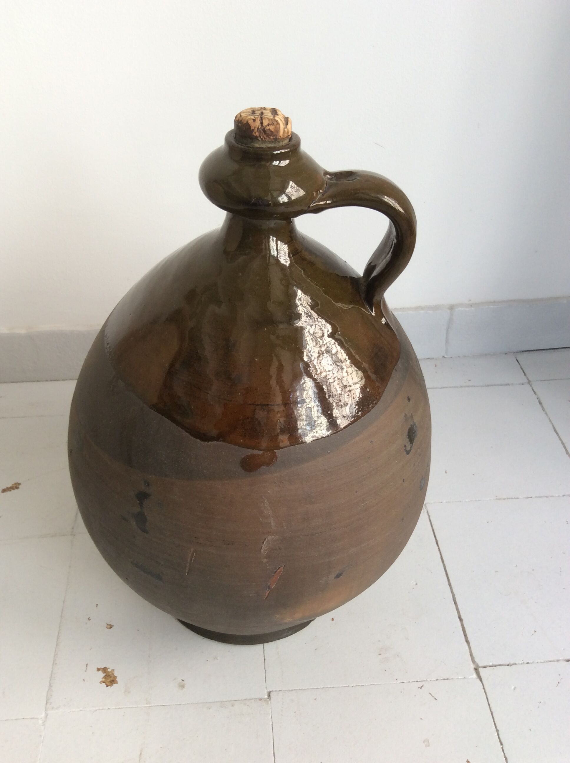 Old terracotta jug glazed Provençal