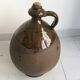 Old terracotta jug glazed Provençal