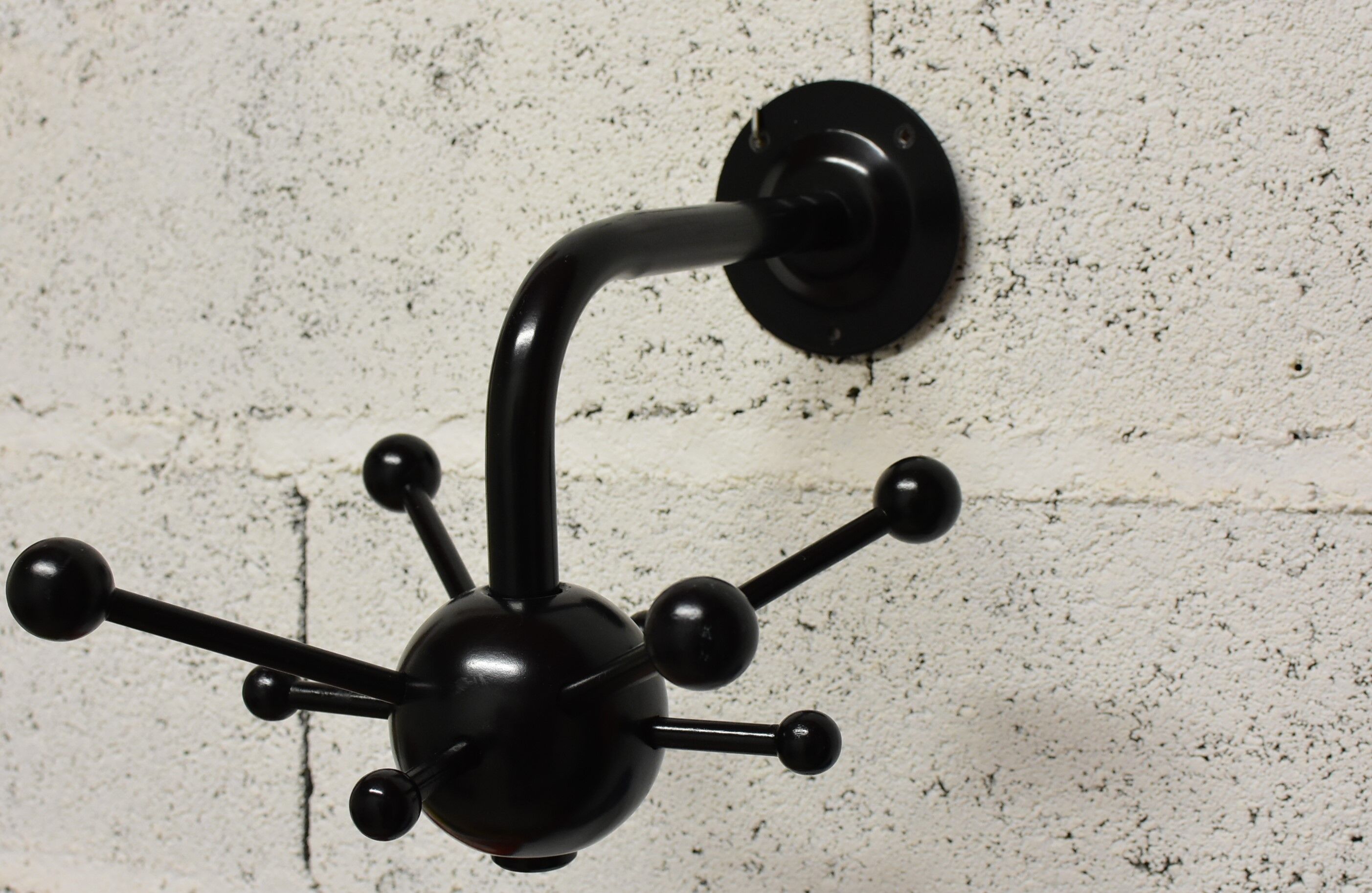 Black sputnik coat rack