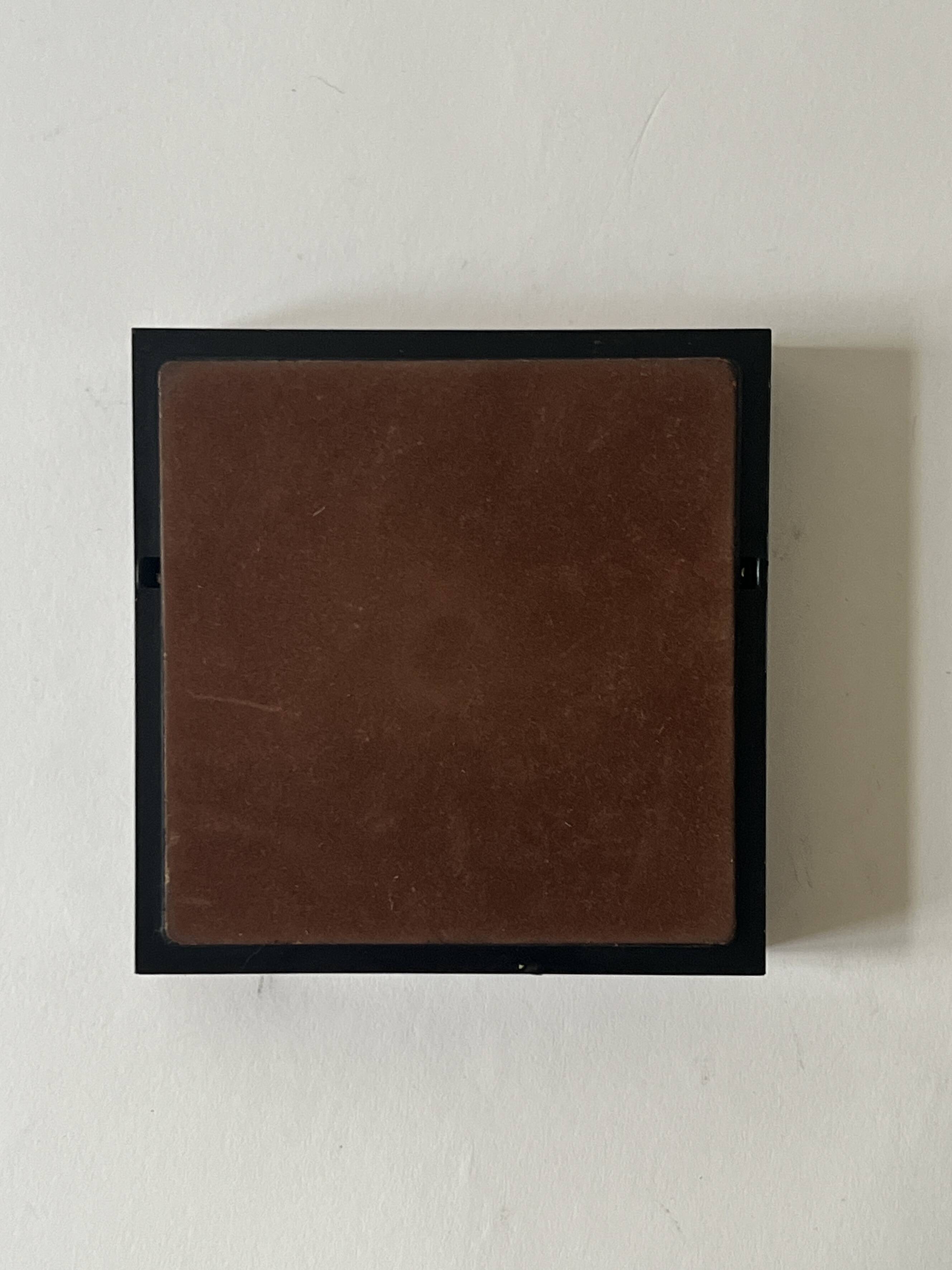 Bakelite and brass pocket emptier, 1970s design