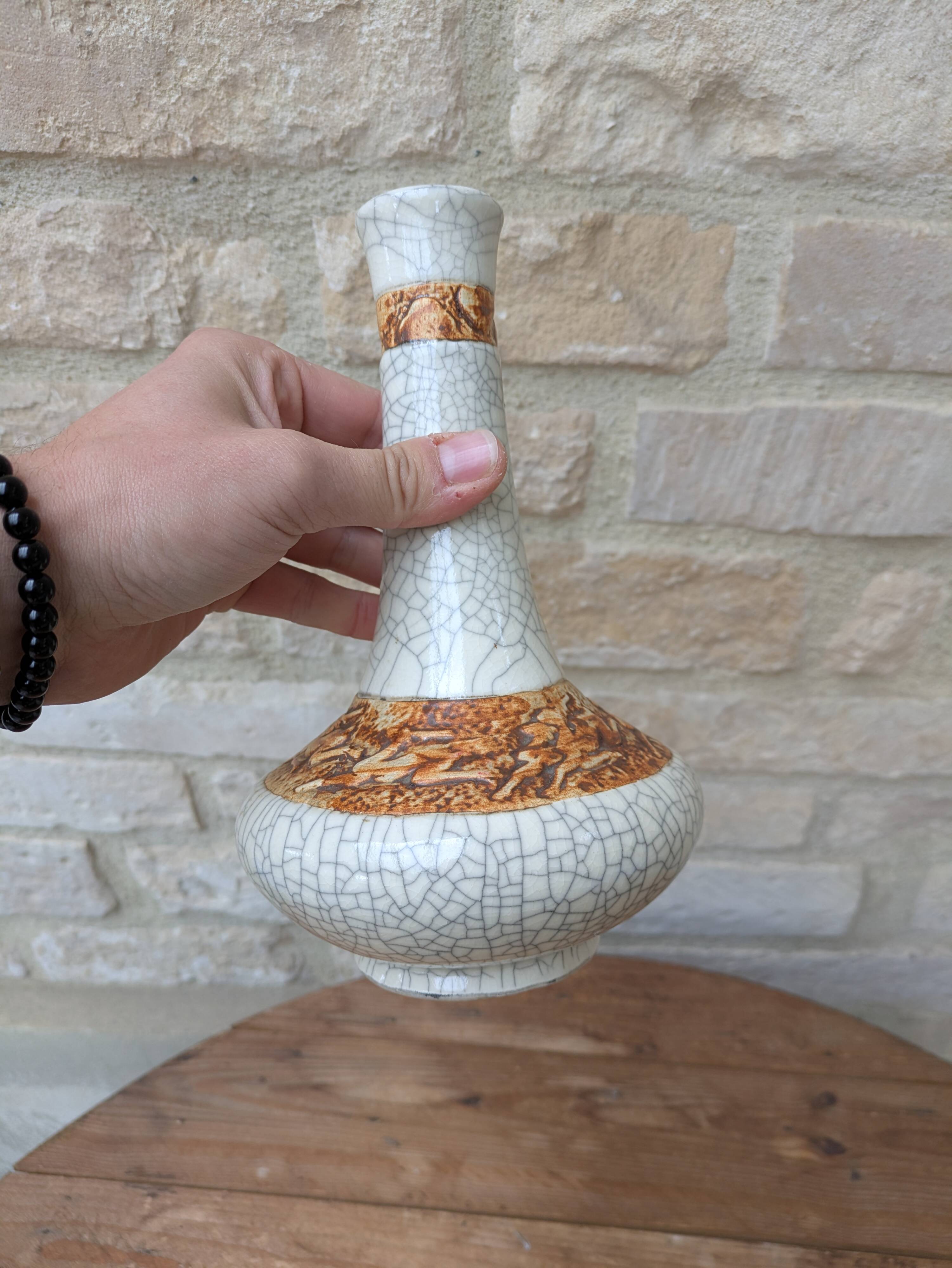 Antique long-necked vase in cracked white ceramic with deer decoration