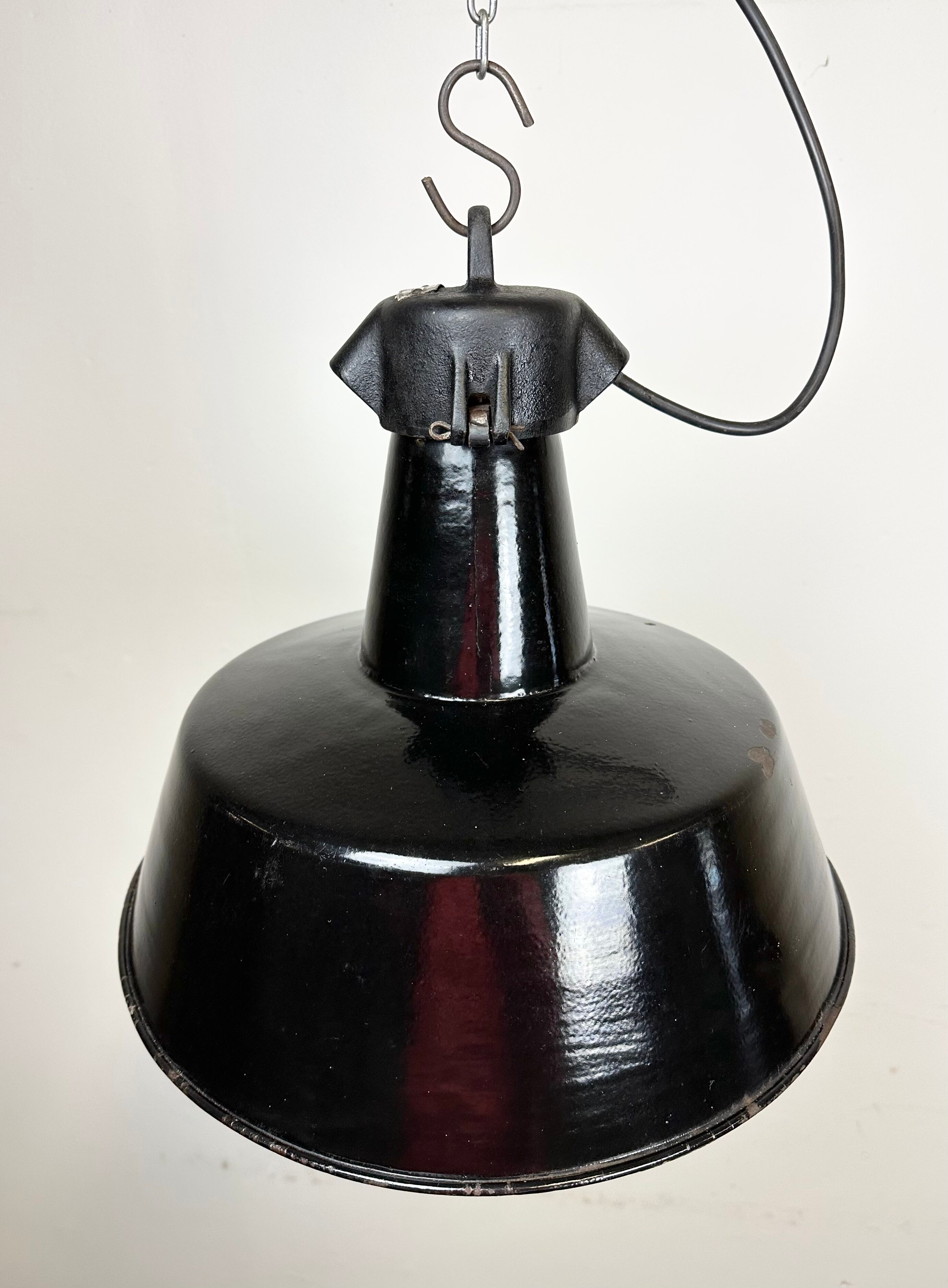 Industrial black enamel factory lamp with cast iron top, 1960s