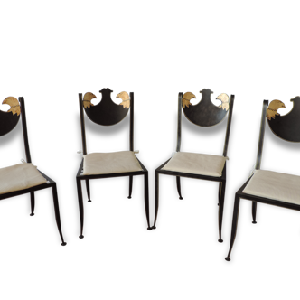 Set of four chairs to decoration of Heads of Raptor on the folder and thread gold on the outskirts of amounts and the seat