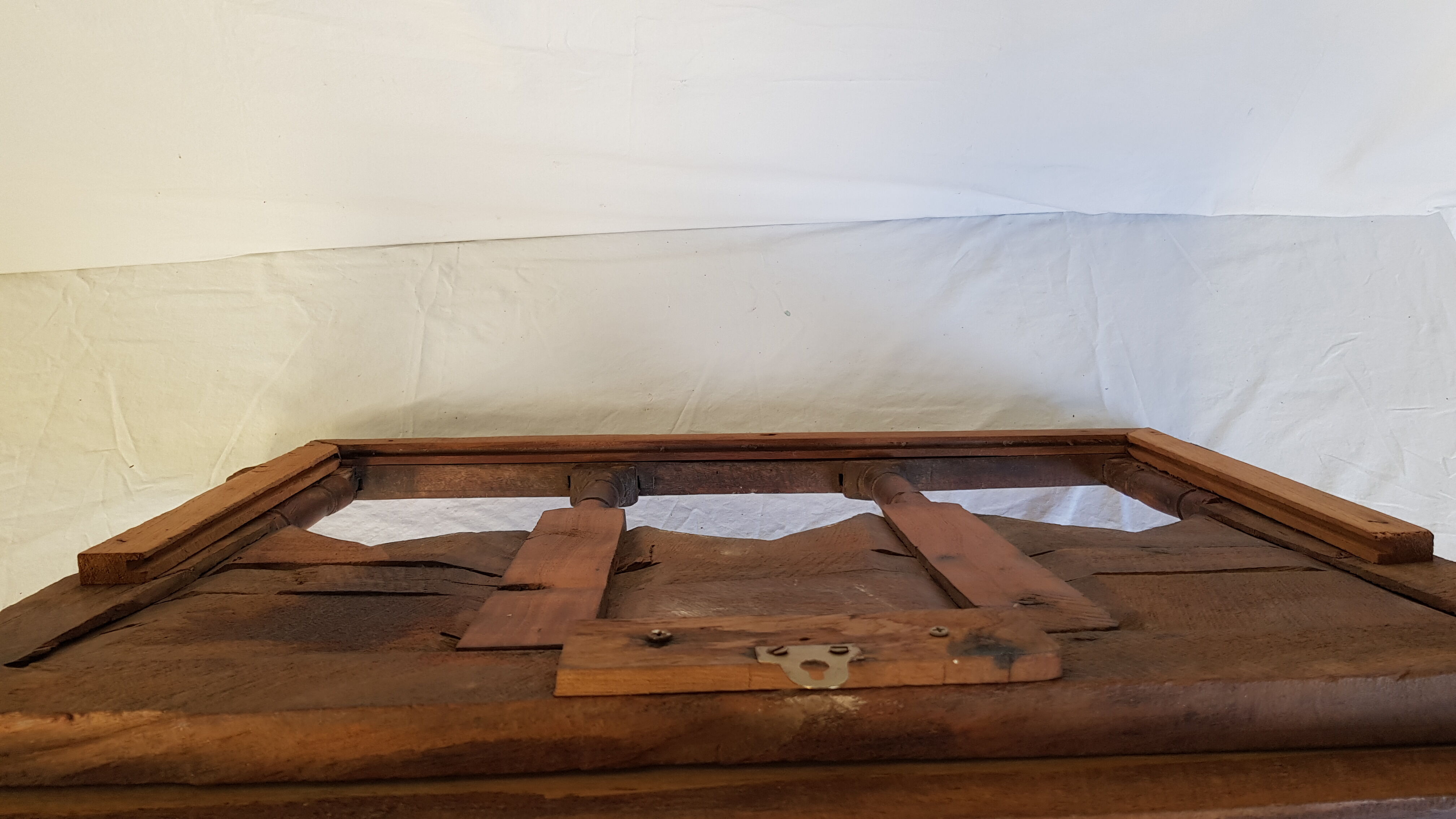 Carved wooden window with rear support for possible mirror