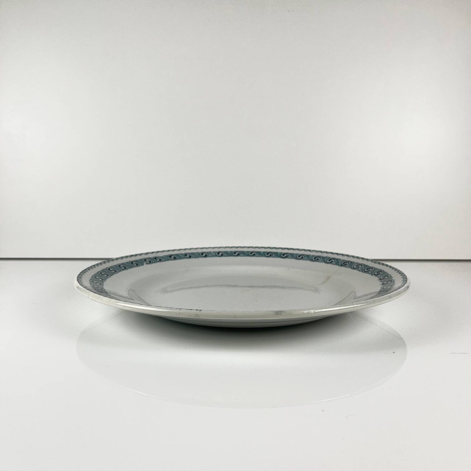 Large round dish "Rachel" Moulins des loups & Hamage, iron earth, 20th century