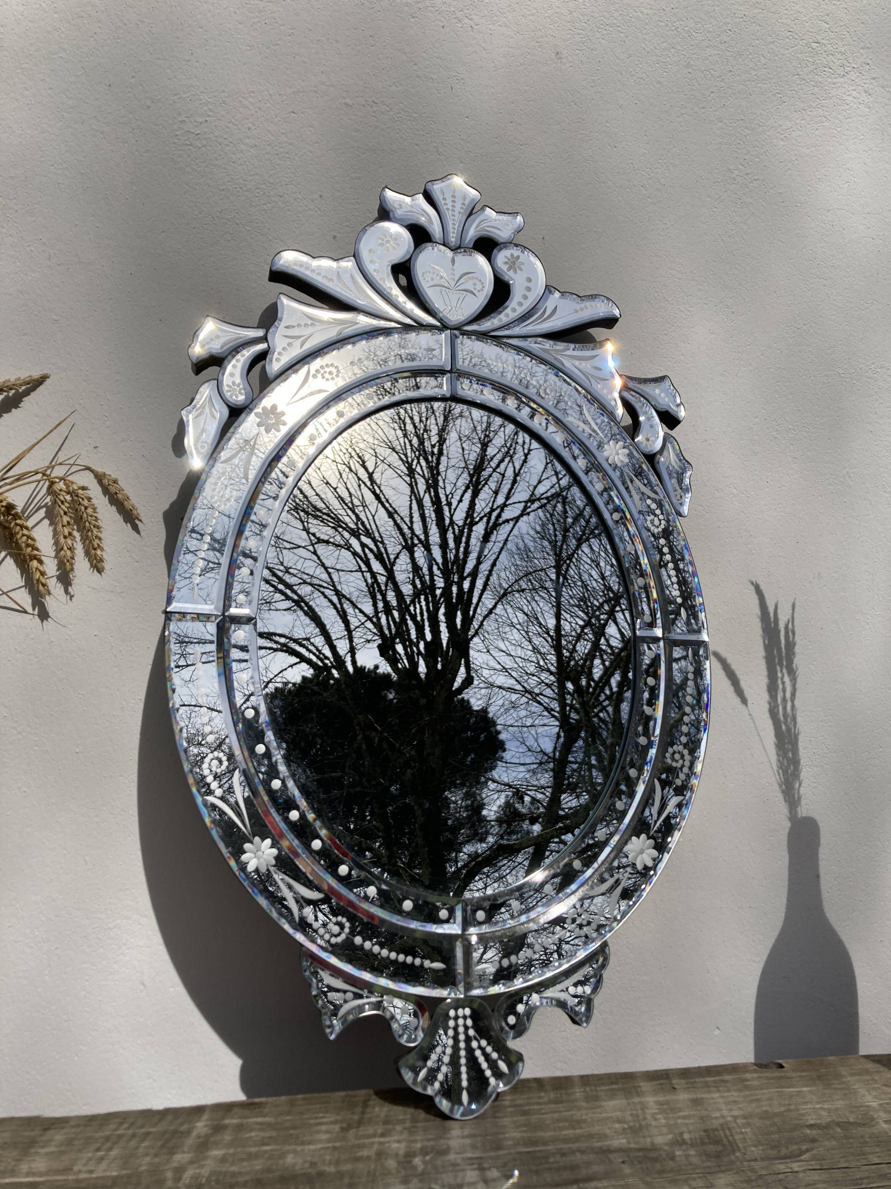 Oval Venetian wall mirror