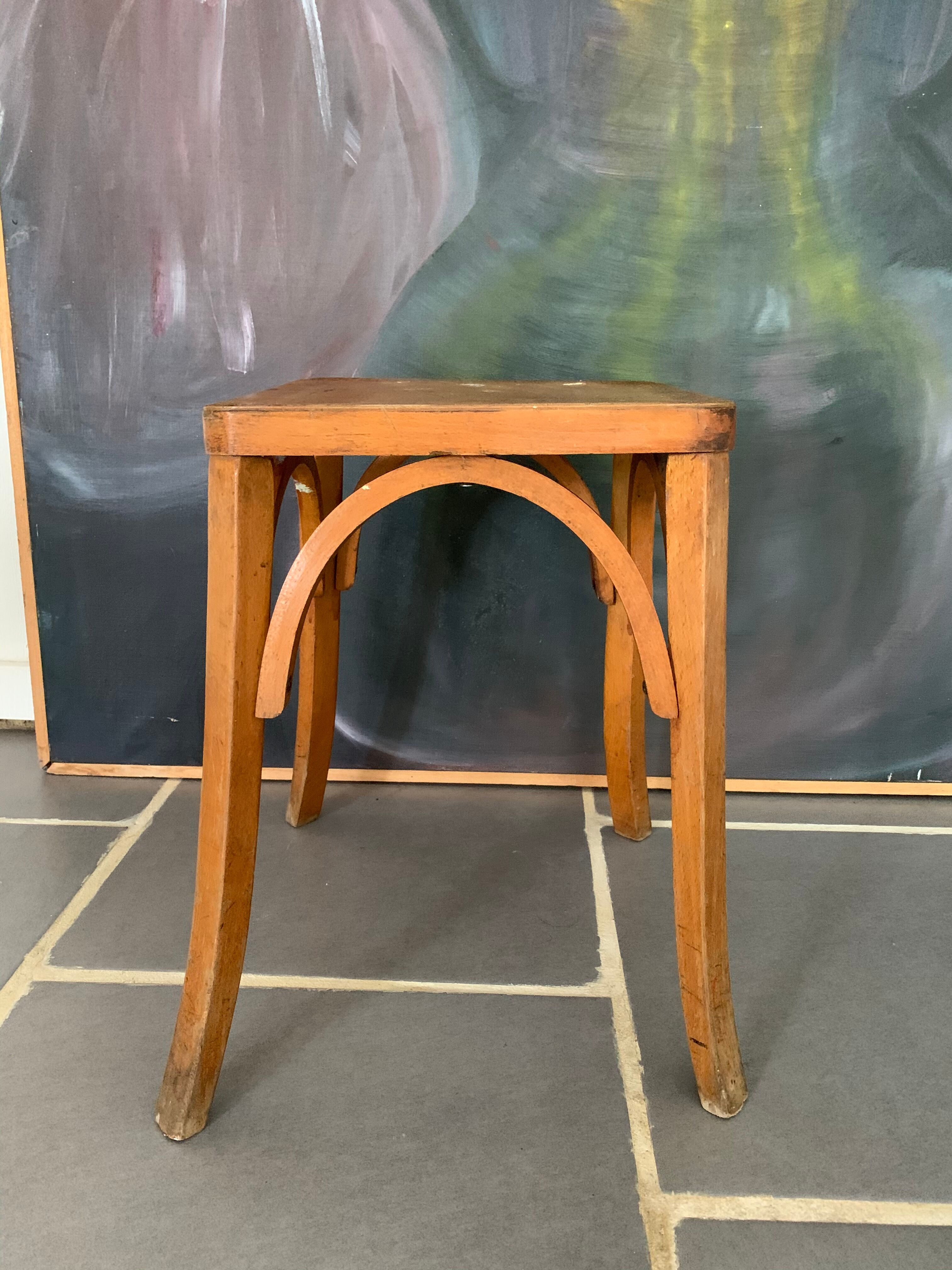 Vintage curved wooden stool