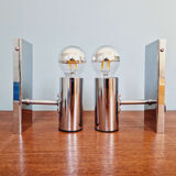 Pair of tubular wall sconces in chrome metal, 1970.
