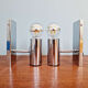 Pair of tubular wall sconces in chrome metal, 1970.