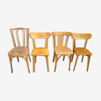 Lot of mismatched old bistro chairs