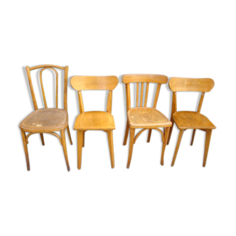 Lot of mismatched old bistro chairs