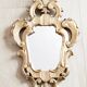 Mirror carved in gilded wood, 19th century