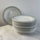 Set of 17 flat plates in Saint Amand earthenware, 22.5cm.