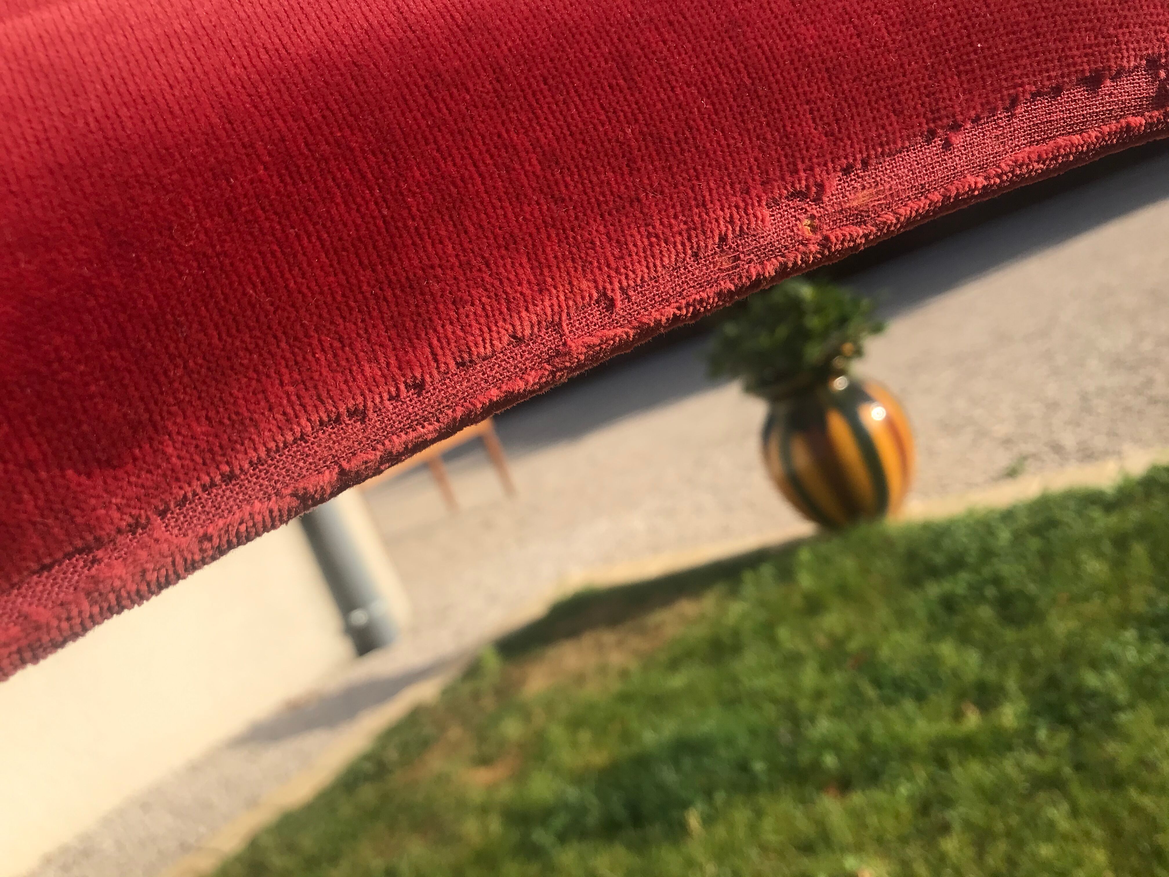 Pair of foldable red velvet chairs