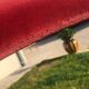 Pair of foldable red velvet chairs
