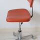 Eurosit vintage industrial workshop chair in chromed metal and orange imitation leather