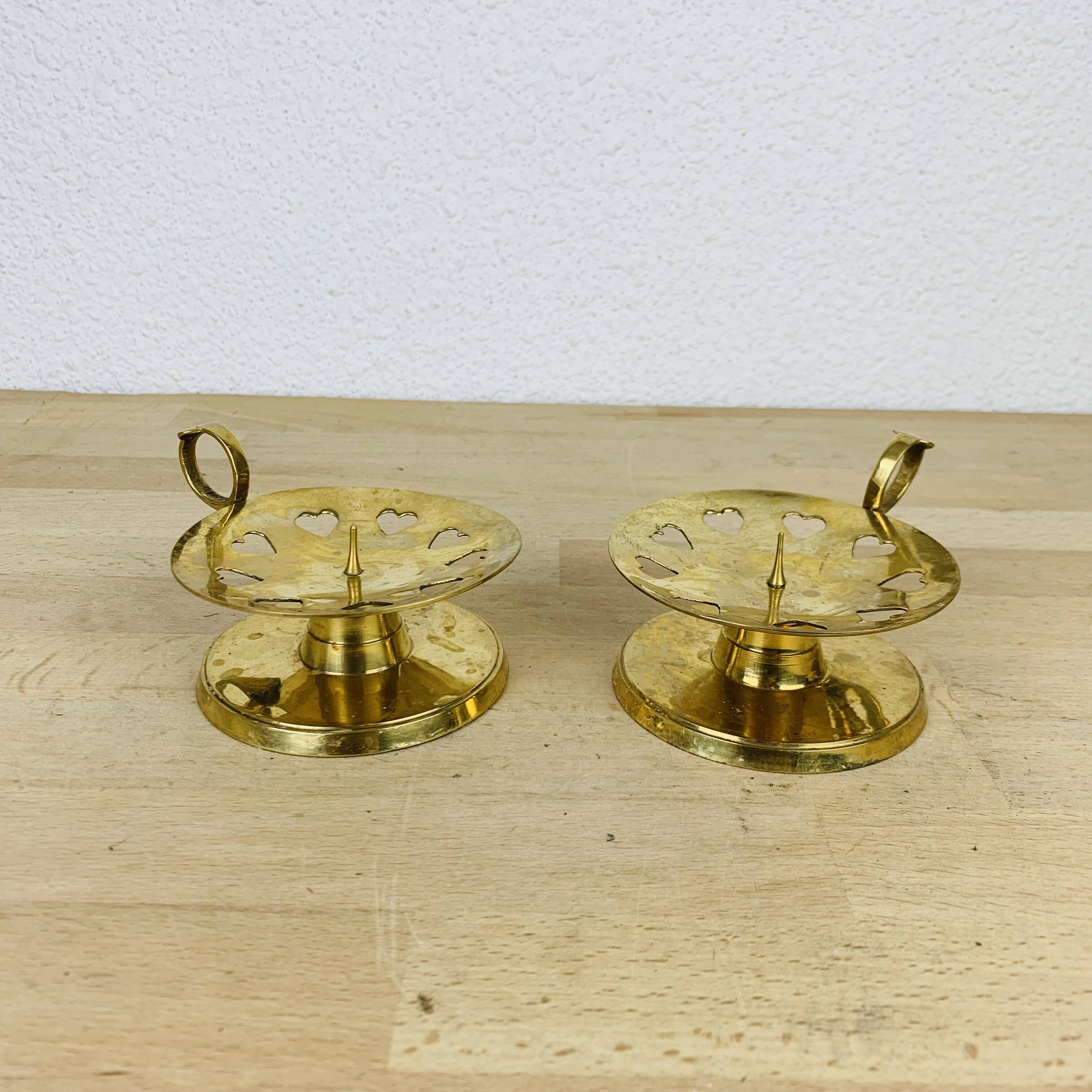 Pair of gilded brass cellar rat candlesticks