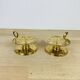 Pair of gilded brass cellar rat candlesticks