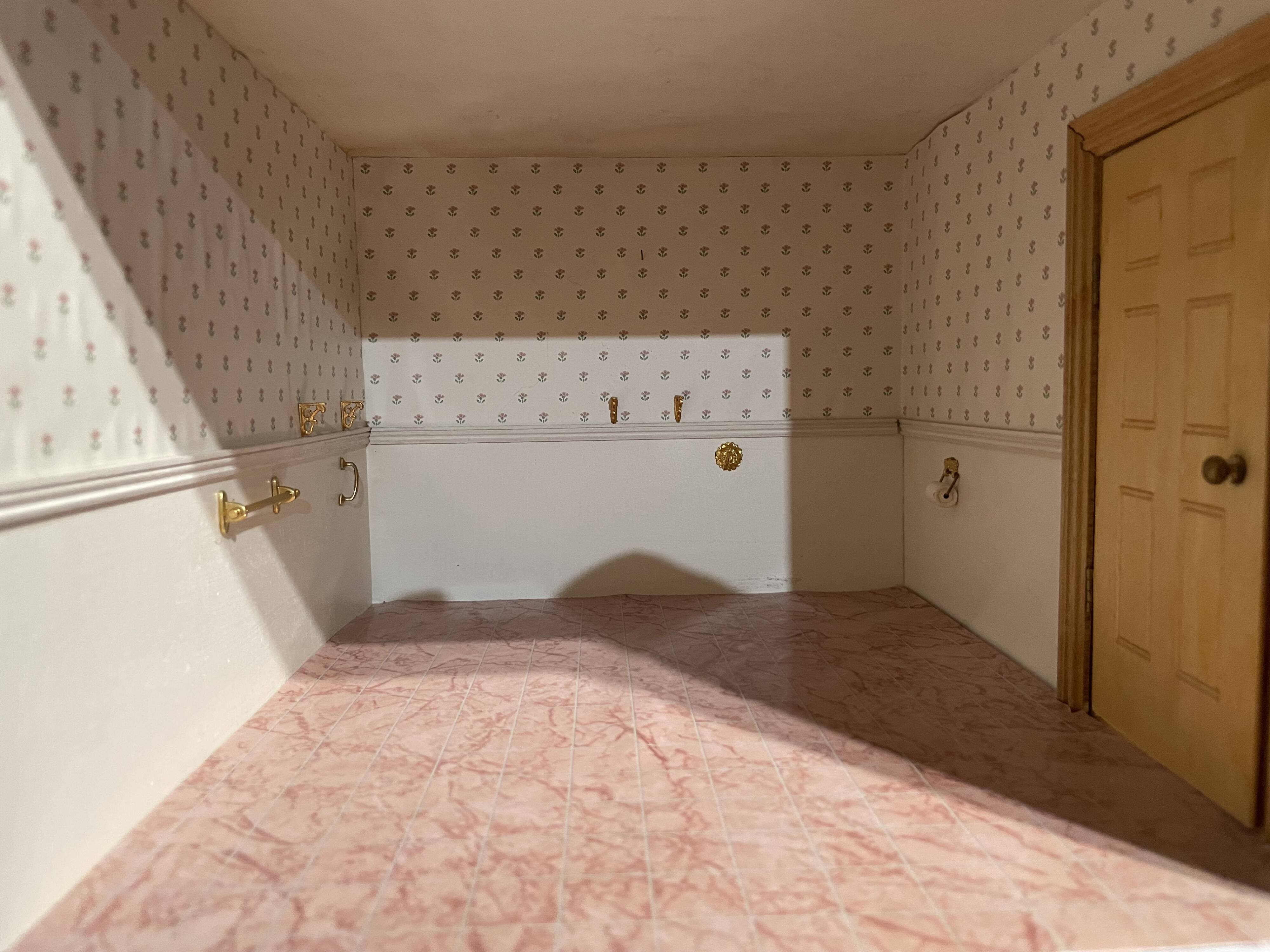 Large wooden dollhouse with miniature furniture