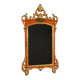 Miroir toscan laqué et doré du XXe siècle
