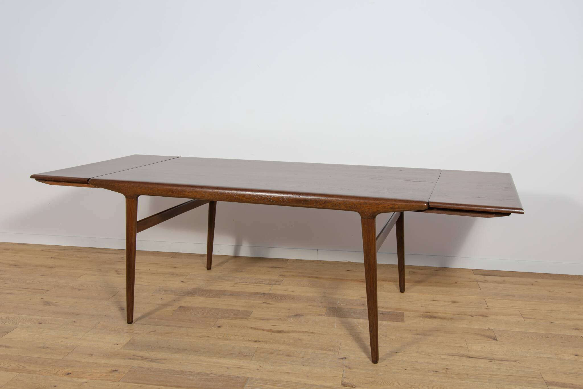 Mid-Century Teak Dining Table by Johannes Andersen for Uldum Mobelfabrik.