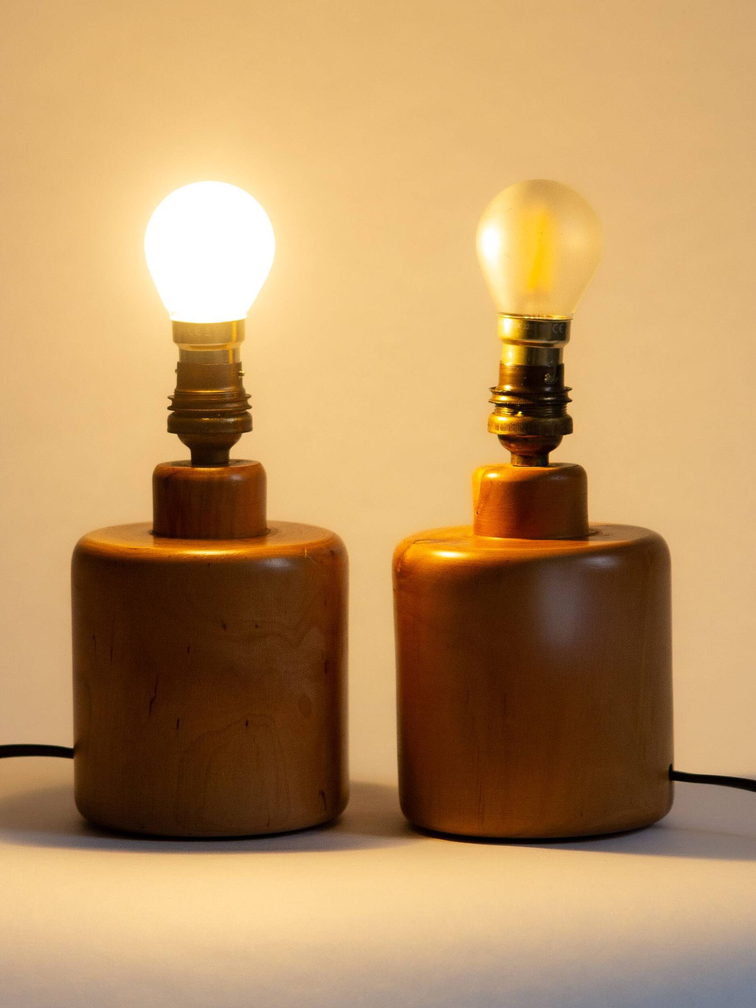 Pair of light wood table or bedside lamp bases, 1970s