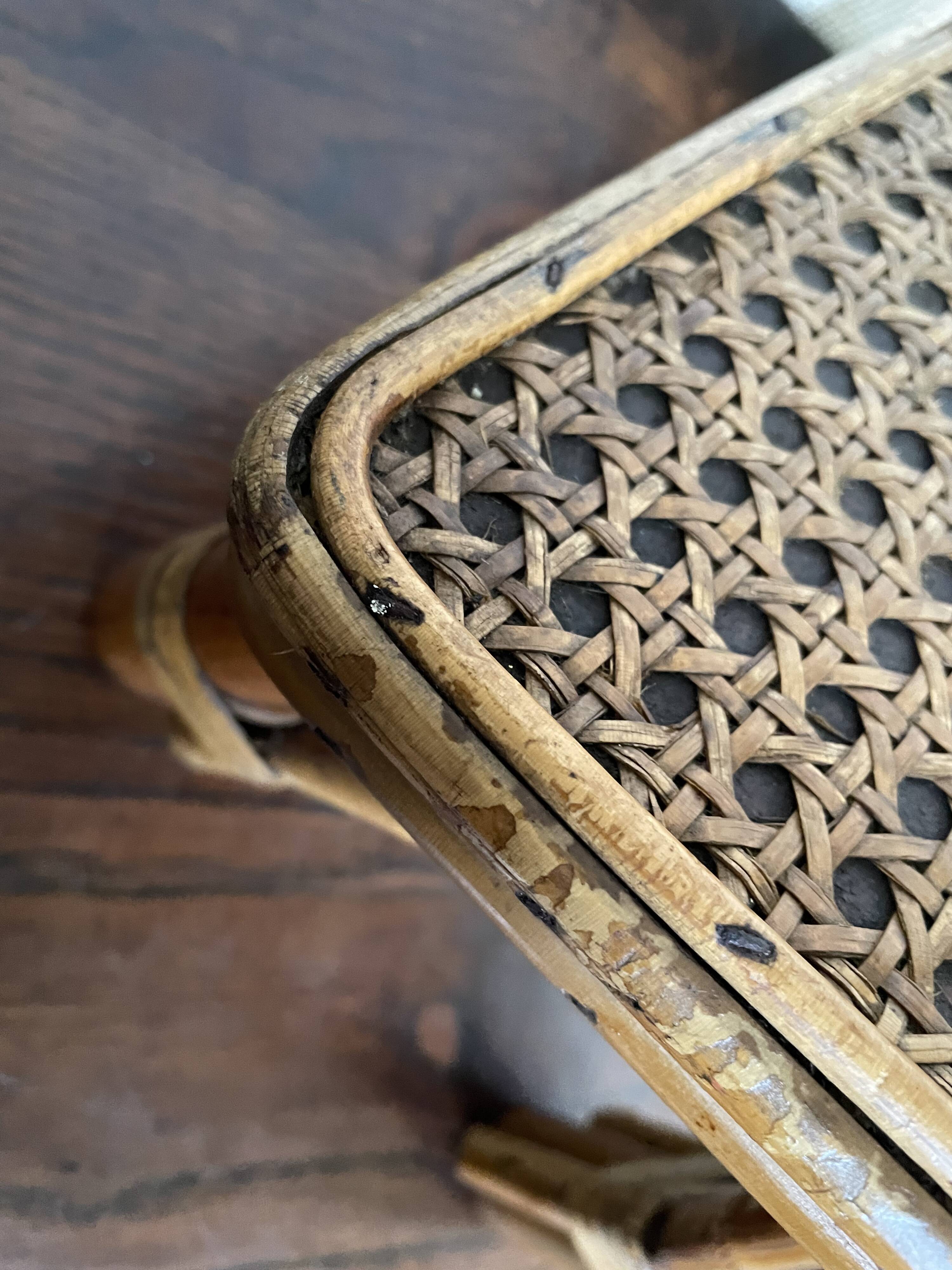 Rattan and cane footrest from the 1950s