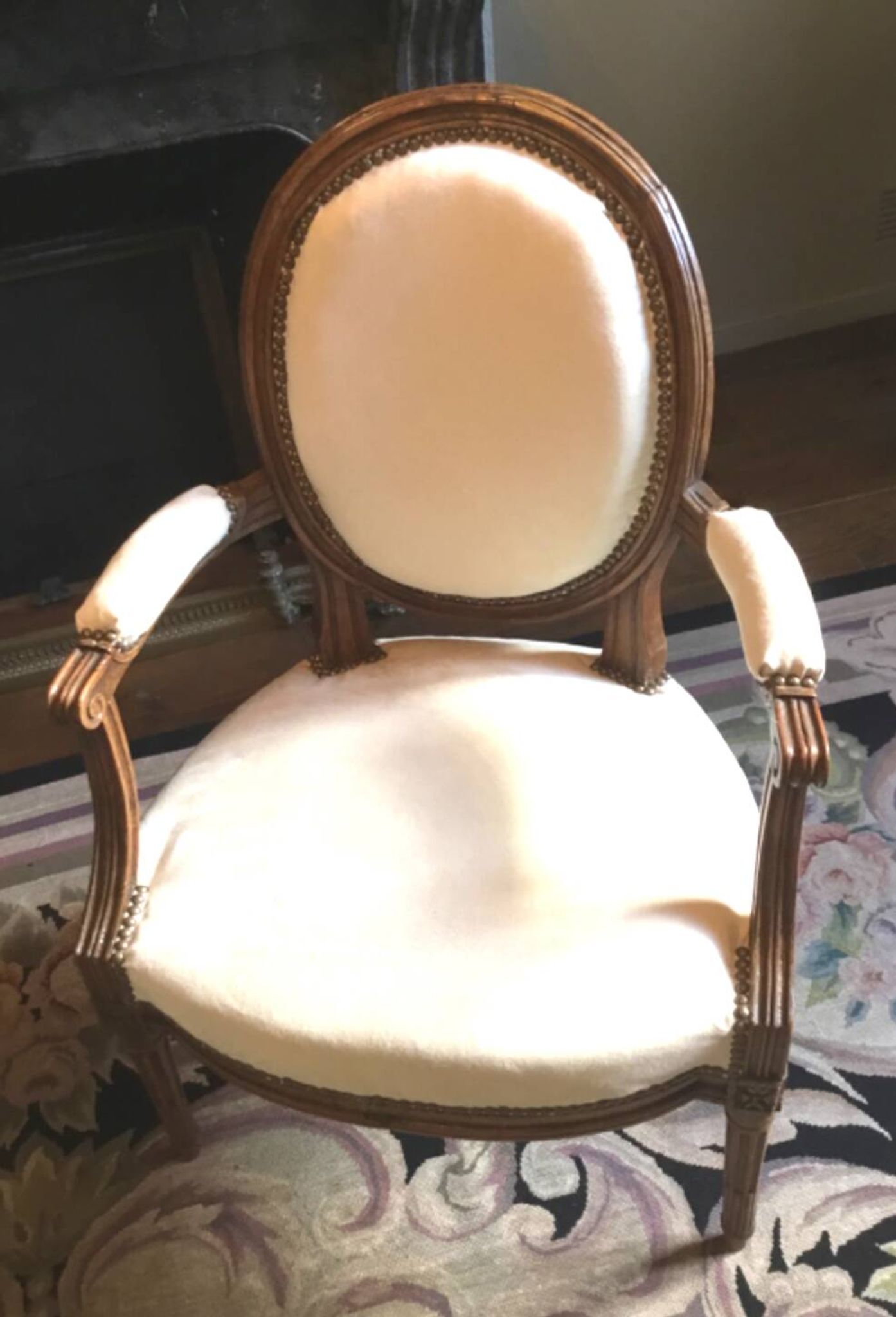 Louis XVI period cabriolet armchair with medallion back