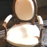 Louis XVI period cabriolet armchair with medallion back